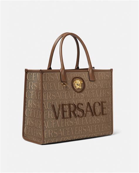 versace collection stein mart purses|Versace large canvas bag.